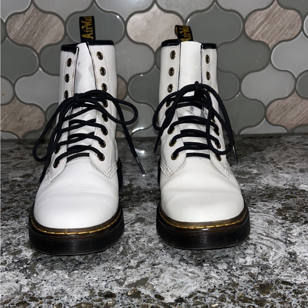 White doc Martin combat boots.